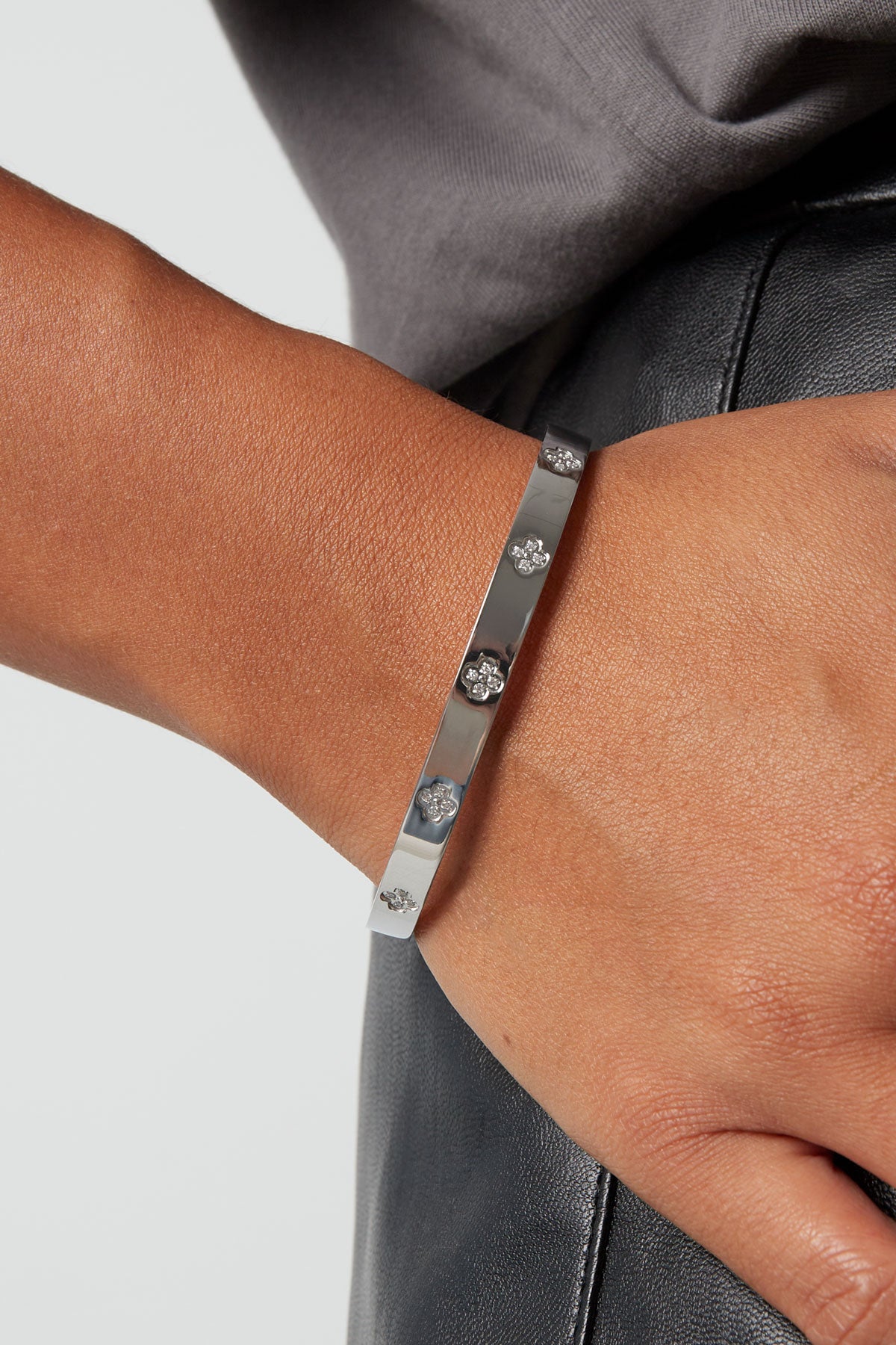 slave bracelet with clovers and stones